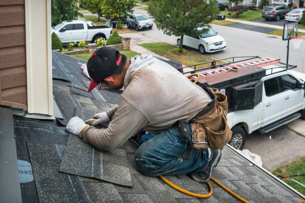 Professional Emergency Roof Repair technician working in Heltonville, IN